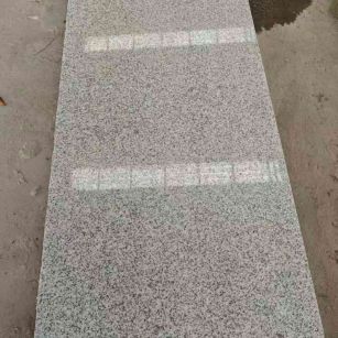 忻州芝麻白光面毛板